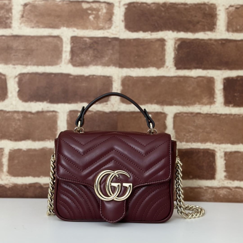 G*u*i top handle bags